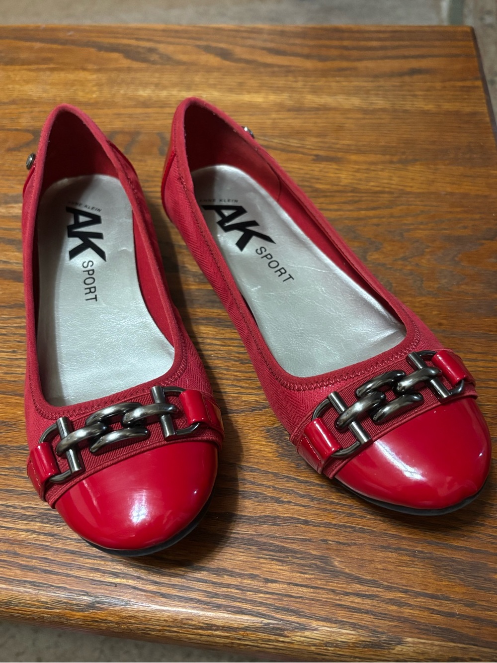 Ann Klein Sport Red Faux Leather Flats With Silver buckle.Rubber sole. Size 8.5
